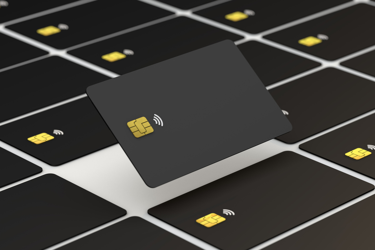 3d black credit card and gold chip